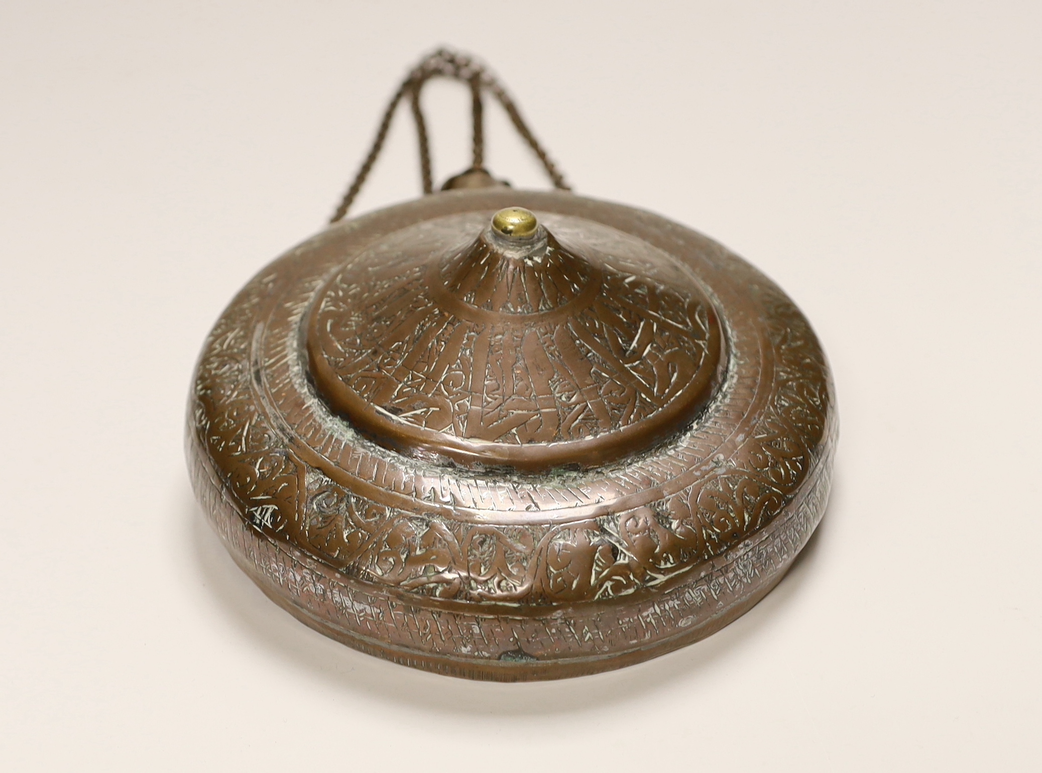 An Ottoman Empire copper water flask with incised decoration, 21cm high